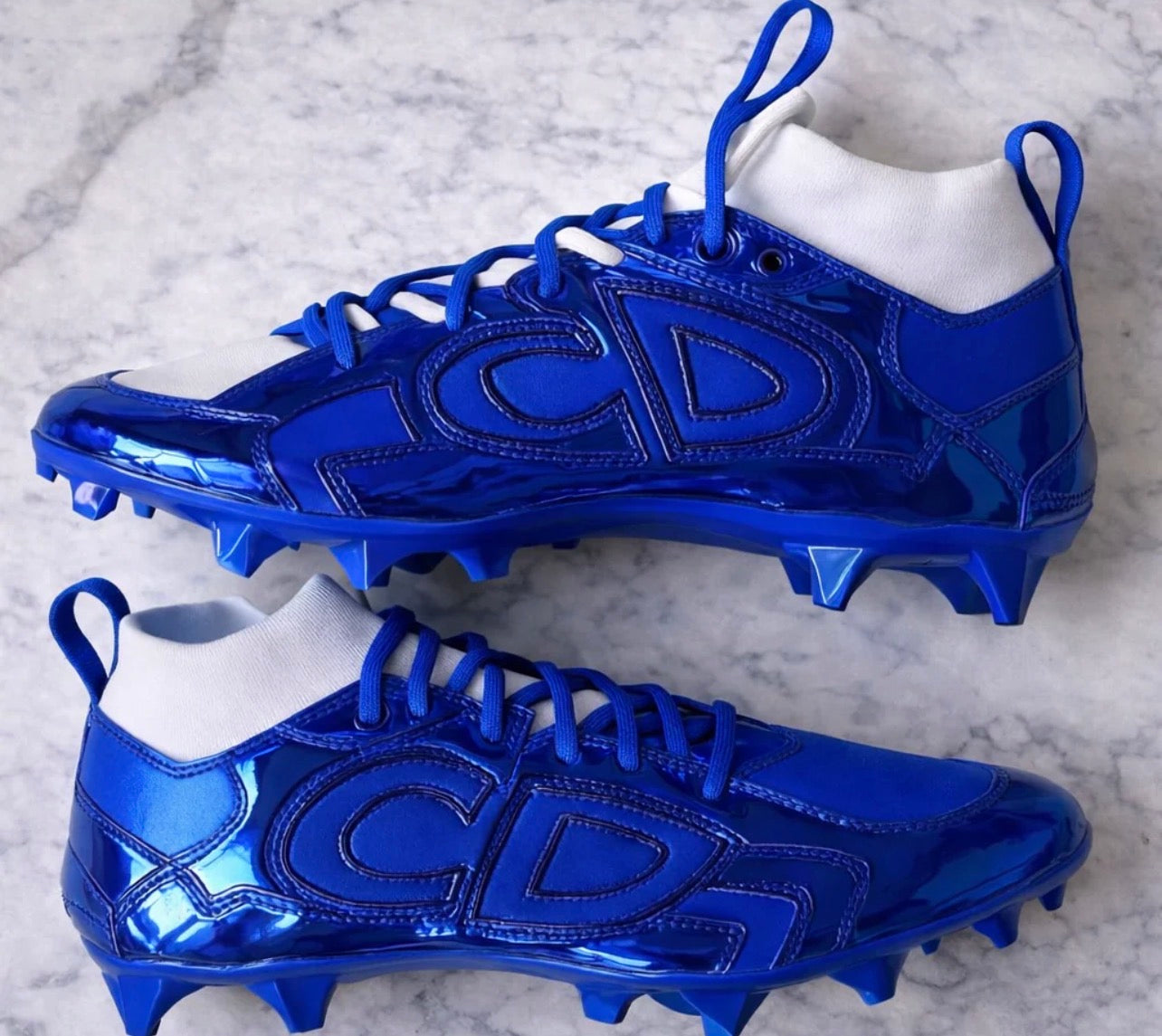 AA Dior Blue cleats