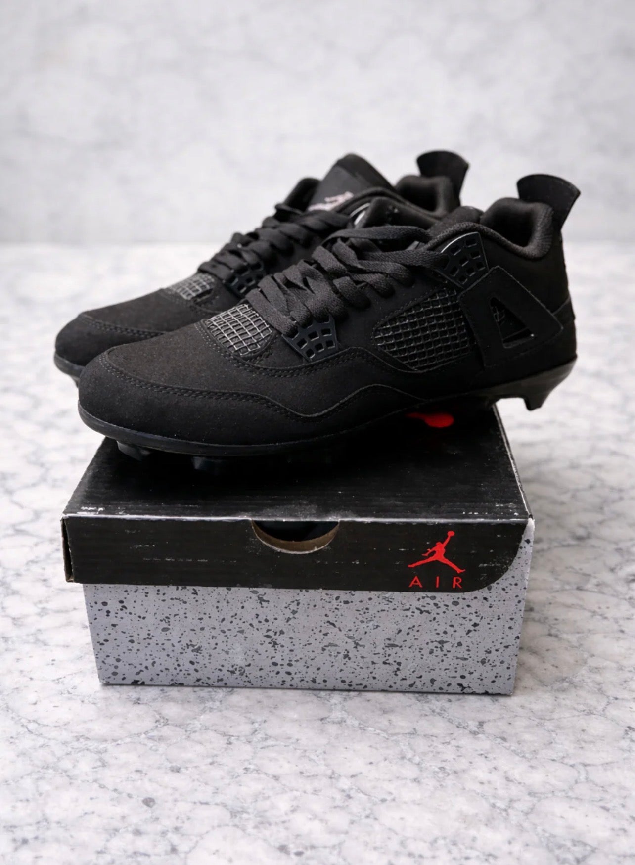 AA black cat 4 cleats